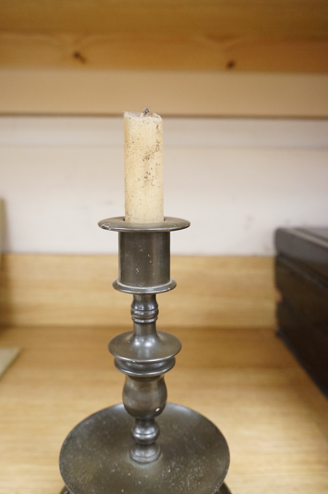 A Dutch bronze candlestick, 24cm high